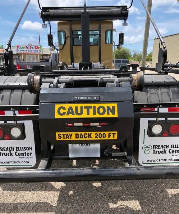 Caution Sticker on Truck — Corpus Christi, TX — White Star Services LLC Caution Sticker on Truck — Corpus Christi, TX — White Star Services LLC